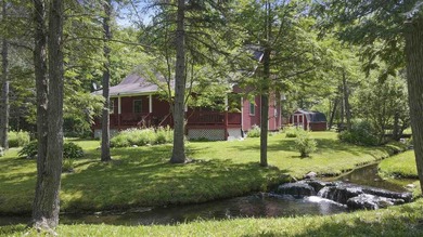 (private lake, pond, creek) Home For Sale in East Jordan Michigan