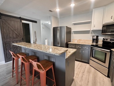 This Lake LBJ waterfront townhome is ideally situated on a - photo 6