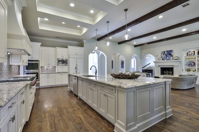 Exceptional French-inspired home with a modern flair, located in - photo 12