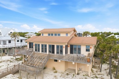 Located within a highly desirable gated coastal community, this