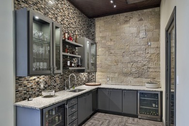 Exceptional French-inspired home with a modern flair, located in - photo 16
