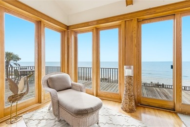 Located within a highly desirable gated coastal community, this