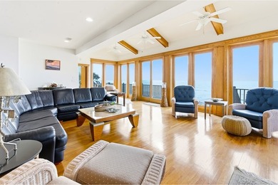 Located within a highly desirable gated coastal community, this