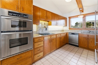 Located within a highly desirable gated coastal community, this