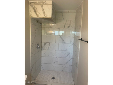 Recently totally renovated  home. It has 3 bedrooms and 1 3/4