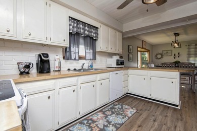 This well-maintained 4-bed, 2-bath home is truly move-in ready - photo 11