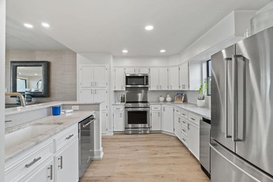 Experience effortless lake living in this beautifully renovated - photo 8