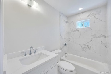 Welcome home in the heart of Mastic; a brand new construction - photo 28