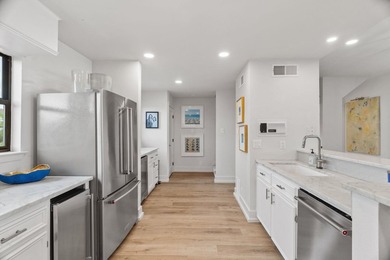Experience effortless lake living in this beautifully renovated - photo 10