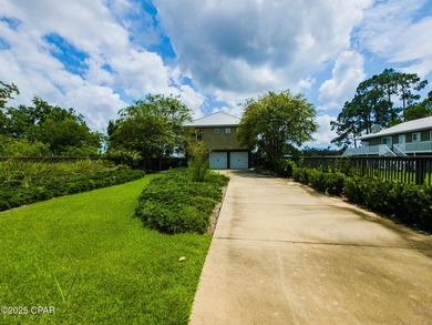Custom-built in 2004 on 9' pilings with 4' of fill, this 2,172 - photo 5