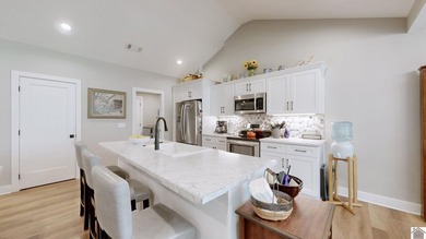 Waterfront living at an accessible price in this nearly new home - photo 12