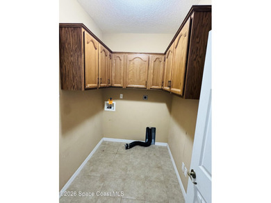 Spacious 4BR/3BA pool home with over 2,300 sq. ft. and a 3-car - photo 2