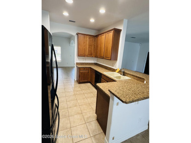 Spacious 4BR/3BA pool home with over 2,300 sq. ft. and a 3-car - photo 6