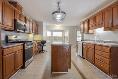 This well-maintained brick single-family home offers a - photo 3