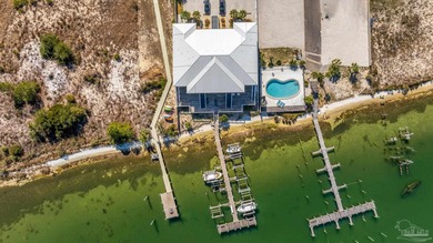 Welcome to modern coastal living at Pescador Landing #3A, where - photo 3