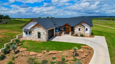 Welcome to 112 Legendary Estates Dr, where modern Hill Country - photo 2