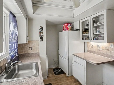 Updated 2 bedroom, 2 bath second floor unit has Vinyl flooring - photo 5
