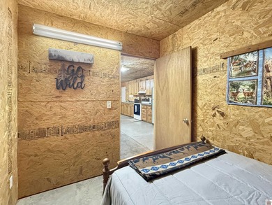 SECLUDED! Tucked away on 1.75 wooded acres, this cute 3-bedroom - photo 11