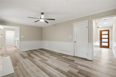 Fully renovated ranch home on a fenced private acre in one of - photo 2
