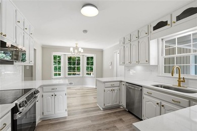 Fully renovated ranch home on a fenced private acre in one of - photo 5