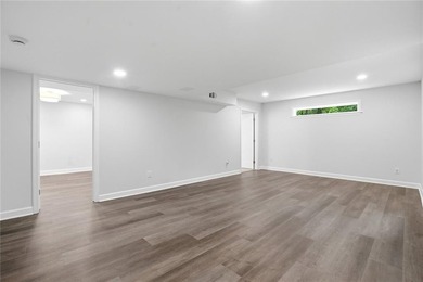 Fully renovated ranch home on a fenced private acre in one of - photo 7