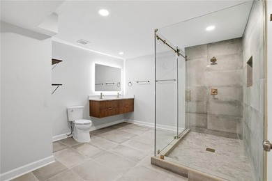 Fully renovated ranch home on a fenced private acre in one of - photo 8