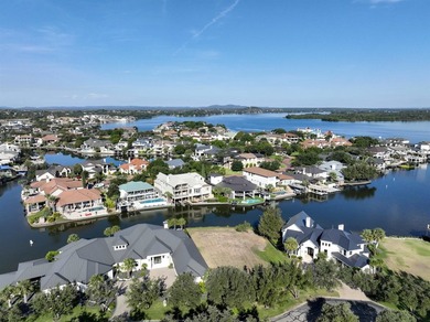 A rare opportunity awaits on Matern Island, a premier gated - photo 2