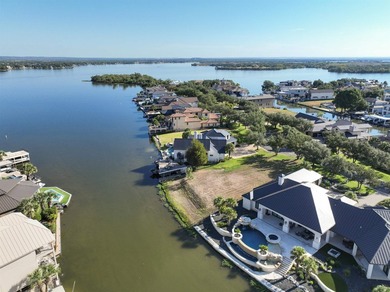 A rare opportunity awaits on Matern Island, a premier gated - photo 3