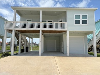 Experience coastal living at its finest in this beautifully - photo 1