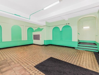 This 1 bedroom 1 bath coop is located at the prime location of - photo 4