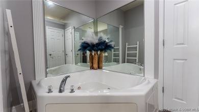 Experience lake living at its finest in this stunning - photo 16
