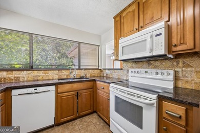 Welcome home to this beautifully refreshed 3-bedroom, 2-bath - photo 16