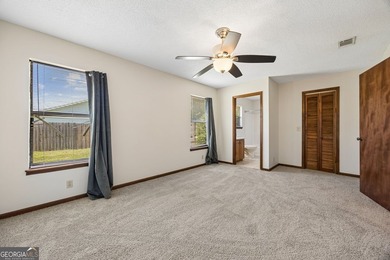Welcome home to this beautifully refreshed 3-bedroom, 2-bath - photo 19