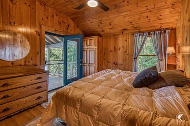 Set on the shores of Lake Champlain in Westport, this classic - photo 32