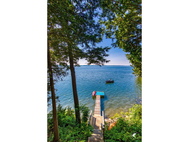 Set on the shores of Lake Champlain in Westport, this classic - photo 38
