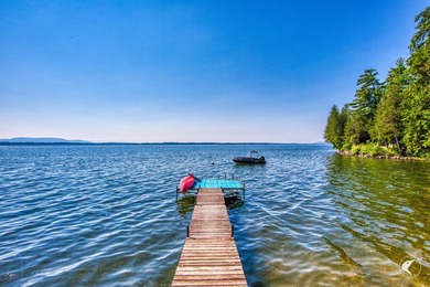 Set on the shores of Lake Champlain in Westport, this classic - photo 44
