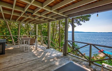 Set on the shores of Lake Champlain in Westport, this classic - photo 47