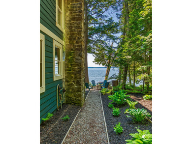 Set on the shores of Lake Champlain in Westport, this classic - photo 48
