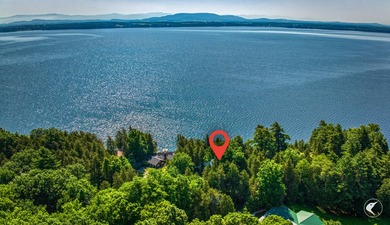 Set on the shores of Lake Champlain in Westport, this classic - photo 50