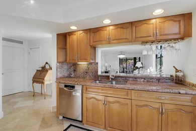 Look No Further! Rarely available 3BR/2BA top-floor end unit in