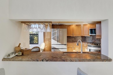 Look No Further! Rarely available 3BR/2BA top-floor end unit in