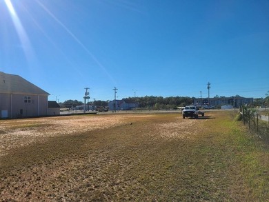 PERFECT LOCATION! THIS PRIME COMMERCIAL PROPERTY IS DIRECTLY OFF - photo 2