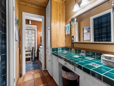 This spacious residence offers 4 bedrooms, 3.5 baths, and a - photo 8