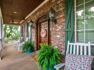 Southern charm shines through in this immaculately maintained - photo 16