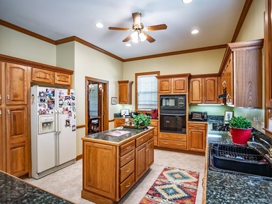 Southern charm shines through in this immaculately maintained - photo 34