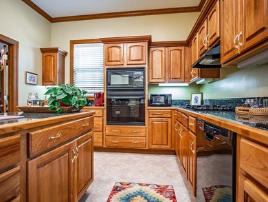 Southern charm shines through in this immaculately maintained - photo 36
