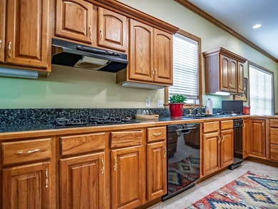 Southern charm shines through in this immaculately maintained - photo 37