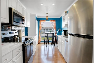 Welcome to this bright 2-bedroom, 2-bathroom condominium located - photo 11