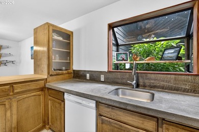 Large windows fill the living spaces with natural light while - photo 12