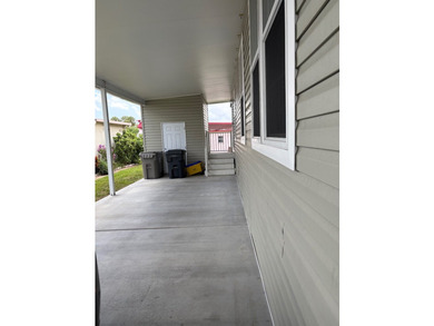 THIS IS A GREAT HOME WITH OPEN FLOOR PLAN AND CARPORT THAT CAN - photo 2